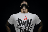 The “Pain Is Fuel” Oversized Tee by Urbantees